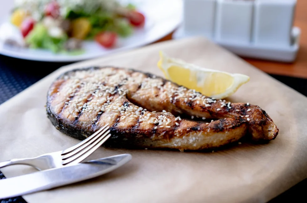 This image shows a grilled fish, which could be a good source of omega-3 that can potentially provide migraine relief.